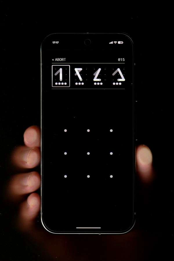 Close-up of the BreakLock game screen, with the attempt history at the top and the pattern grid in the center for making new attempts.